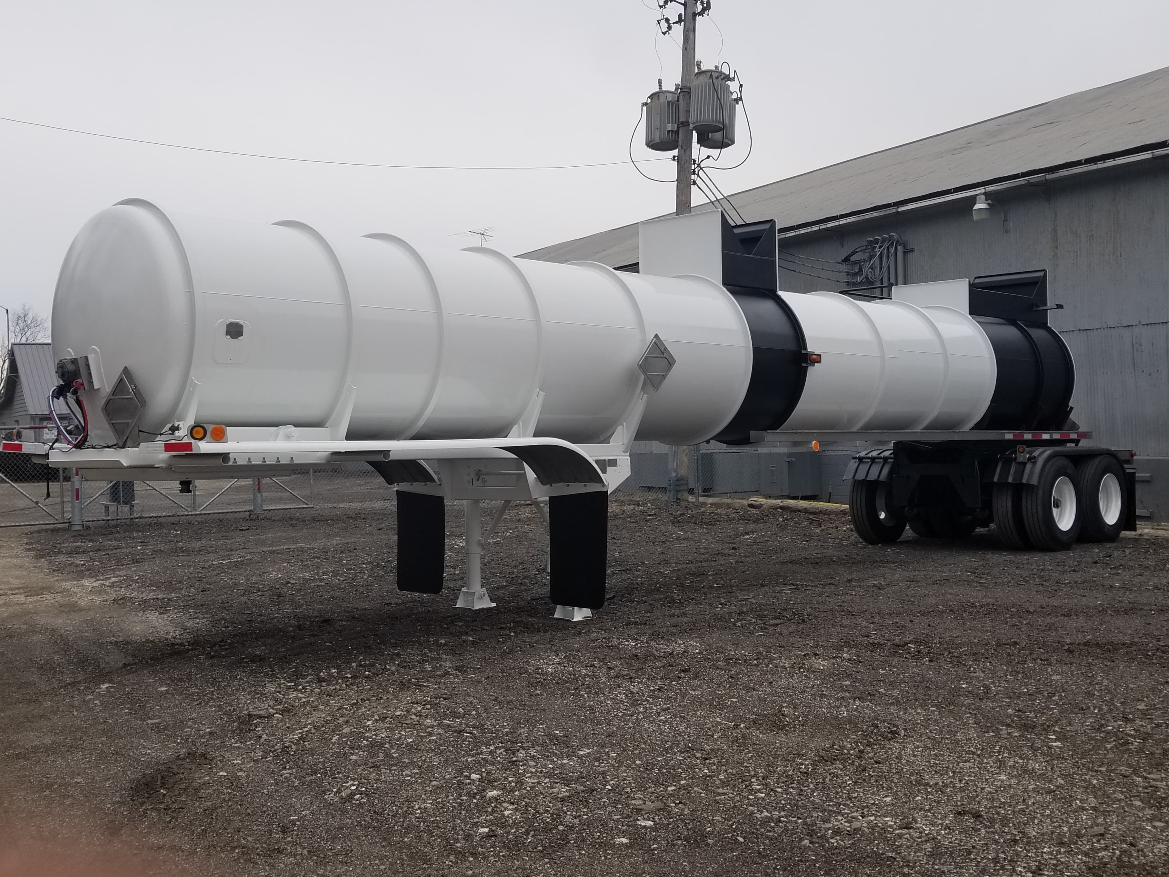 Completed acid trailer restoration showing quality paintwork