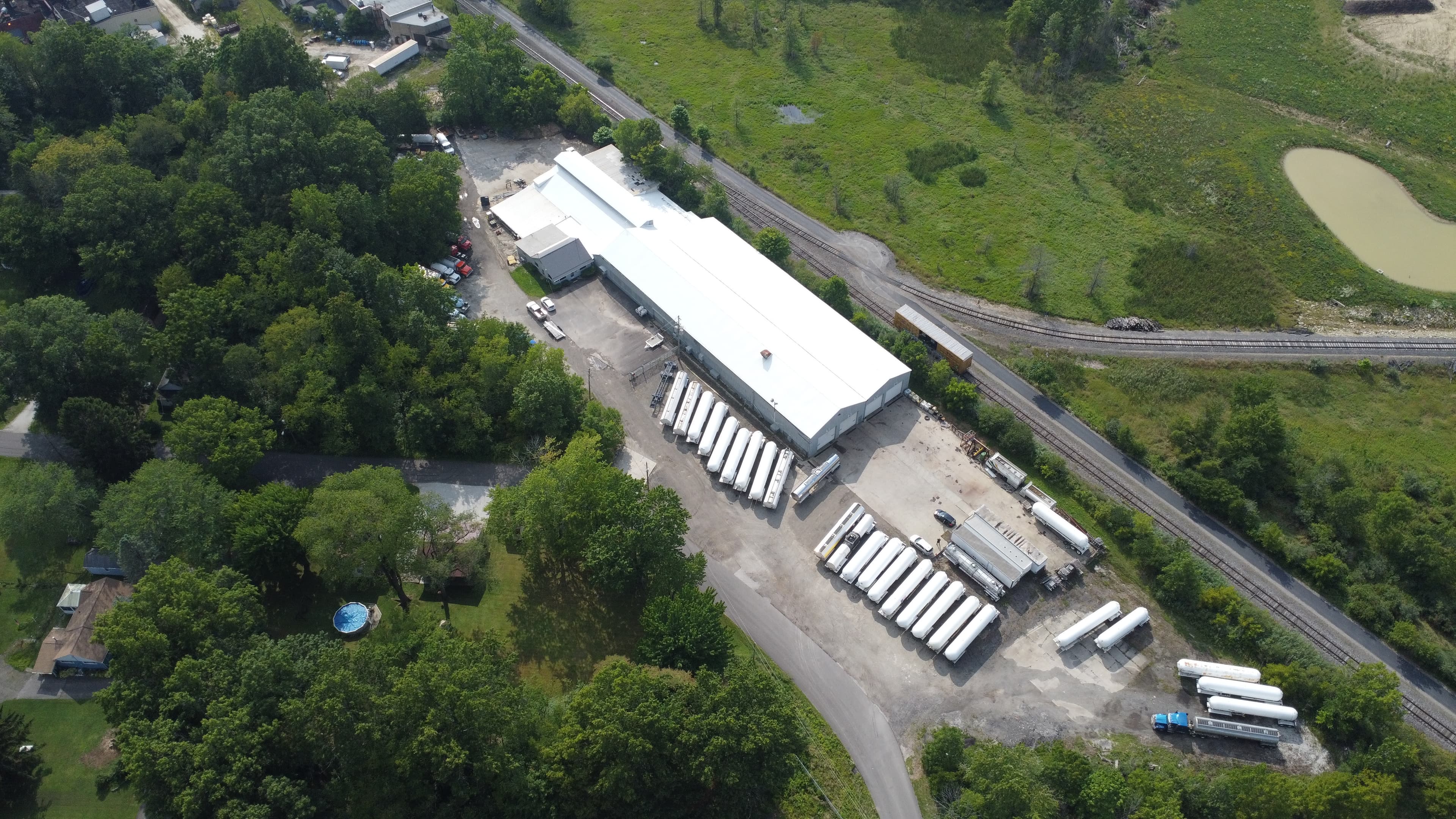 Overhead aerial of the Schaeffer shop and yard with tank trailers staged for service